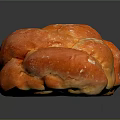 Freshly Baked Braided Bread With Golden Brown Crust And Powdered Sugar Topping