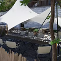 Outdoor Restaurant Seating Area With Trees Umbrella Stone Steps And Greenery