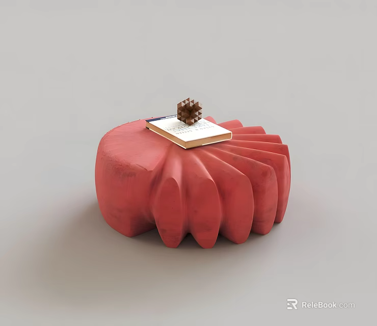 Red Stool with Petal Shaped Design Topped With Small Book And Pine Cone 3d model