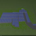 Aerial Planning of Neatly Arranged Blue Roofed Buildings With Green Spaces And Roadways