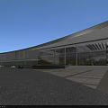 Modern Museum Building Featuring Wavy Striped Glass Facade Green Lawn and Plaza Under Blue Sky