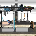 Kitchen Sink Area With Hanging Dish Rack Plates Bowls And Utensils On Countertop