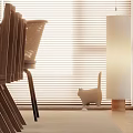 Cozy Restaurant Corner With Wooden Table Wicker Chair Books And White Floor Lamp