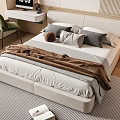 Modern Double Bed With White Headboard Soft Pillows And Brown Blanket In Bedroom