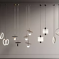 Various modern pendant lights with unique designs displayed on gray wall 3d model