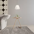 Modern Wooden Side Table Three Legs Design With Green Plant And Books Near White Sofa