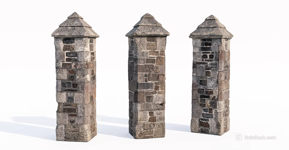 Three Decorative Stone Brick Columns With Pointed Tops And Textured Surfaces 3d model