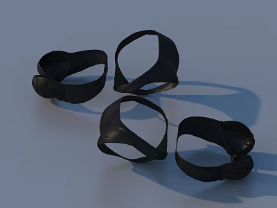 Black Clothing Ring Accessories Four Pieces On Light Blue Background 3d model