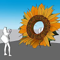 Giant Sunflower Sculpture Featuring Circular Hole With People Inside And Person Taking