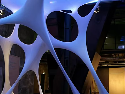 Modern White Illuminated Sculptural Art With Curved Hollow Design In Indoor Space 3d model