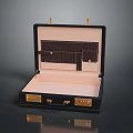 Elegant Black Open Suitcase Featuring Pink Lining And Golden Hardware
