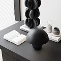 Black Mushroom Shaped Inflatable Decor On Table With Books And Bulb Ornament