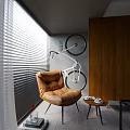 Modern Brown Leather Bean Bag Chair Interior With Side Table Coffee Cup And Wall Bicycle