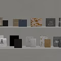 Luxury Brand Shopping Bags Display On White Shelves With Various Designs