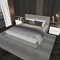 Modern Double Bed With Striped Blanket Decorative Pillows And Fireplace