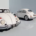 Two Vintage White Beetle Cars Parked In Modern Clean Display Space