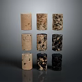 Wood and Stone Cylindrical Objects with Various Textures and Colors Arranged in Three Rows