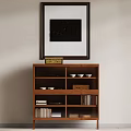 Wooden Decorative Cabinet with Framed Painting Above and Shelves Holding Bowls and Books