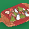 Christmas Themed Cookies On Wooden Tray With Red Cloth And Holiday Shapes