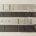 Various Electrical Switches And Power Sockets In Different Colors And Designs