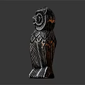 Intricate Carved Metallic Owl Decorative Figurine Set With Feather Details On Black Display Surface