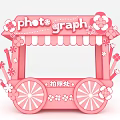 Pink Flower Decorated Photo Spot Cart With Striped Awning And Photograph Sign