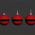 Red Christmas Ornaments With Black Stripes And Metallic Hooks On Gray Surface
