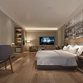 Modern Hotel Room Interior Featuring Bed TV Wooden Desk Chair Sofa And Decorative Wall Art