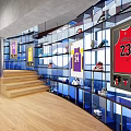 Modern Shopping Mall Store Interior Featuring Transparent Display Cases Figurines Yellow Counter And Circular Lights
