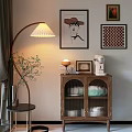 Cozy Buffet Cabinet with Glass Doors Floor Lamp Table Lamp Coffee Machine and Wall Paintings
