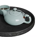 Elegant Celadon Ceramic Teaset With Teapot And Teacups On Black Tray