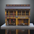 Traditional Chinese Two Story Yellow Building Model With Red Lanterns Tables And Chairs