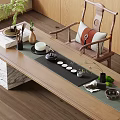Elegant Tea Set On Wooden Tea Table With Green Mat Small Cups And Decorative Plants