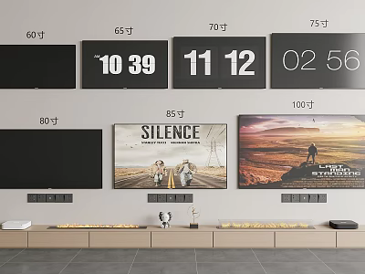 Various Size Televisions With Digital Displays And Movie Posters On Wall 3d model