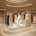 Elegant Modern Bridal Store Display With Circular Platform Mannequins Bridal Gowns And Lighting