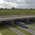 High Speed Train Passing Under Concrete Railway Viaduct With Green Landscape