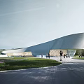 Modern Museum Building With Curved Roof And Landscaped Green Lawns And People Walking