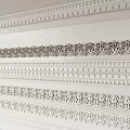 Decorative Wall Lines With Various Intricate Patterns And White Architectural Trim