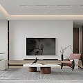 Modern Living and Dining Room Interior With Gray Sofa Round Coffee Tables And Abstract Artwork