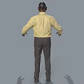 Man In Yellow Shirt Black Tie Gray Pants Brown Shoes With Arms Outstretched On Gray Background
