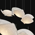 Modern Artistic Pendant Lights With Curved Fabric Shades Hanging In Black Background