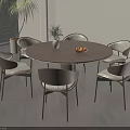 Modern Round Dining Table Set with Six Chairs Vase and Fruit Bowl on Wooden Floor