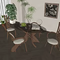 Restaurant Dining Space Featuring Round Glass Table Wooden Chairs Green Plants And Decorative Painting