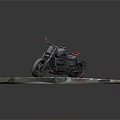 Black Cruiser Motorcycle With Red Accents On Gray Stone Pavement