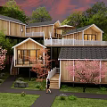 Wooden Guesthouse Buildings With Balconies Amid Cherry Blossom Trees And Green Lawn
