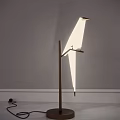 Bird Shaped White Table Lamp with Golden Metal Stand and Minimalist Design