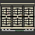 Beige Gas Range Oven With Multiple Burners Control Knobs And Green Towel