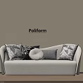 Poliform Two Seater Sofa with Various Patterned Cushions on Beige Wall Wooden Floor