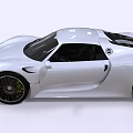White Sleek Sports Car With Streamlined Body And Black Alloy Wheels