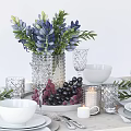 Complete Tableware Set With Bowls Plates Cutlery Wine Glasses Candles And Floral Decor